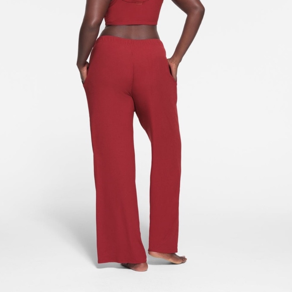 Skims Soft Lounge Loose Straight Leg Pants with Pockets in Brick Red - Picture 3 of 8